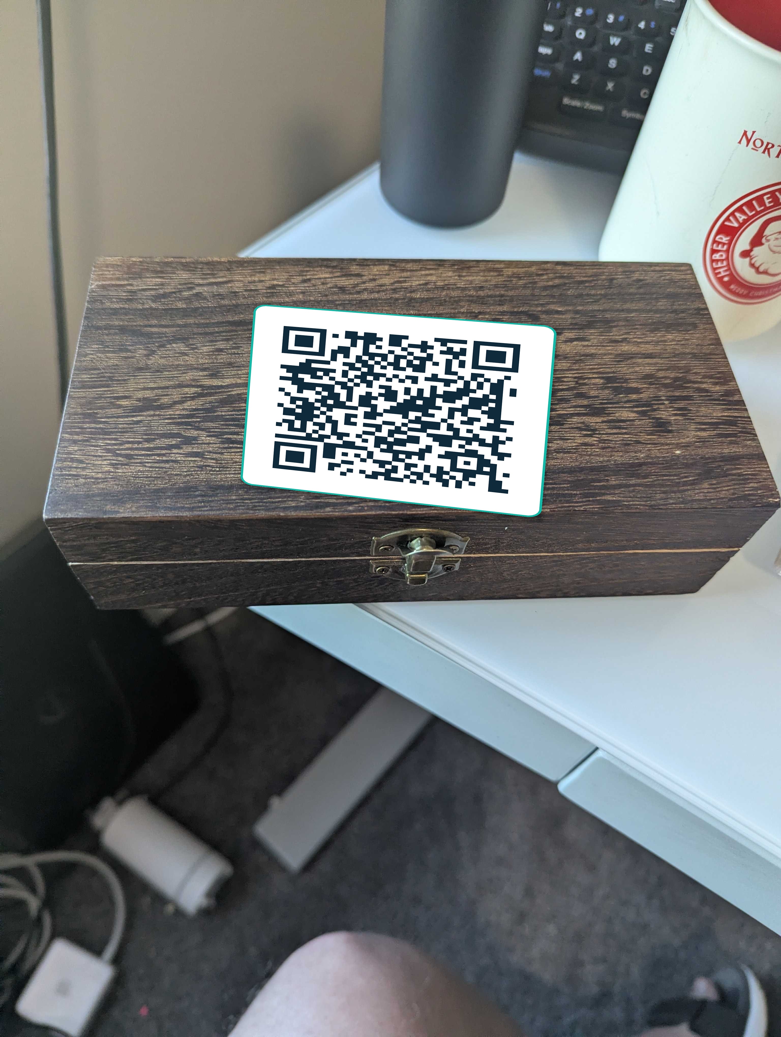 The real DailyDoseBox with its QR code on the lid